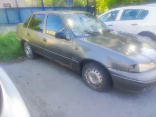 Daewoo Nexia 2003 легковой автомобиль 2003 г.в., г.н. Т822ЕЕ02, VIN ULV3D31UD3A008372, цвет серо-бежевый, техническое состояние неудовлетворительное, имеются следы ржавчины на кузове, в технически неисправном состоянии.