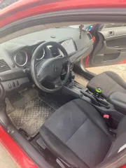 Mitsubishi Lancer 2008 года выпуска, красного цвета, VIN: JMBSRCY2A8U011235. Пробег 254 000 км. В неисправном техническом состоянии: требуется замена электро рулевой рейки, замена или ремонт АКПП (не работает 2 передача), замена цепи, замена ГРМ и роликов, замена клапанов и шатунов, неисправна…