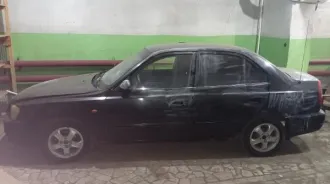 Hyundai Accent черный 2006 года, пробег 517596 км, VIN X7MCF41GP7A091154, передний привод.