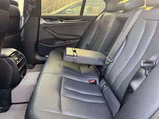 Легковой автомобиль BMW 520i VIN X4XJA19480WC06408 2018 года выпуска, черный. На ходу, документы и ключи в наличии.