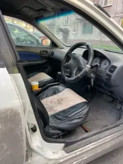 Nissan Wingroad 1999, Легковой автомобиль, марка: НИССАН, модель: ВИНГРОАД, год изготовления: 1999, цвет: Белый, г/н: Н830УТ42, кузов №: WFY11007381 Особенности тех. состояния: протертый салон, разбитый бампер и отсутствие передней фары