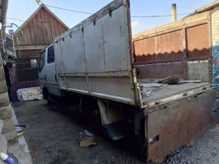 Транспортное средство Митсубиси Кантер выпуска 1998 года,  Грузовой бортовой, VIN отсутствует, цвет белый/серый, гос. рег. знак К161УХ75