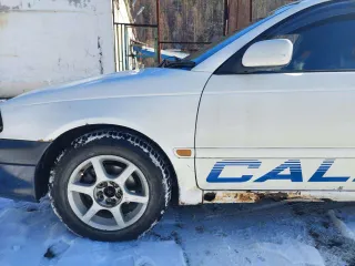 Легковой автомобиль Toyota Caldina 1998 года выпуска, государственный номер А162АМ49.