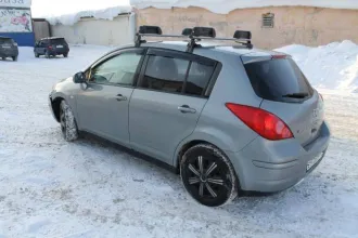 Nissan Tiida 2008 года, 110 л.с., АКПП. Автомобиль легковой Nissan Tiida 1.6, 2008 года выпуска, государственный регистрационный знак Е918ВМ154, VIN 3N1FCAC11UL445513.