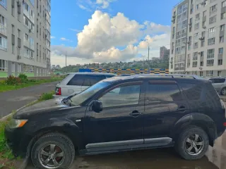 Mitsubishi Outlander 2008 OUTLANDER 2.4 Черный, VIN JMBXTCW5W9Z006075, год выпуска 2008, гос. номер К623РС702.