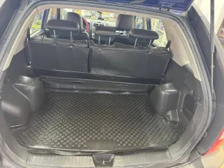 Kia Sportage 2007 года, 140 л.с., пробег 165000 км, полный привод. VIN: KNEJE55257K369889, государственный номер Н114ТВ39. Тип двигателя: бензин, мощность 104 кВт (141 л.с.), цвет кузова синий.