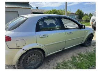 Chevrolet Lacetti 2011 года выпуска. VIN XUUNF487JB0008921, пробег 186 000 км. Двигатель бензиновый, объем 1.4 л (1399 см³), мощность 95 л.с., механическая коробка передач.