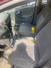 Opel Corsa 2003 года, цвет темно-красный. VIN: W0L0XCF6834415266. Мощность двигателя 75 л.с. (55 кВт), объем 1199 куб.см. Максимальная масса 1430 кг, масса без нагрузки 1035 кг.