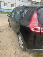 Renault Scenic 2010, черный. VIN: VF1JZ1B0D42981280, ПТС: 78УМ113166, госномер: В311ЕУ45. Производитель: Renault S.A.S. (Франция). Двигатель бензиновый, модель K4MR858, номер D056377, мощность 110 л.с. (81 кВт), объем 1598 куб. см. Кузовной номер: VF1JZ1B0D42981280. Экологический класс 4…