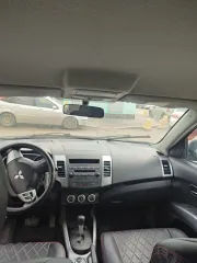 Mitsubishi Outlander 2008 OUTLANDER 2.4 Черный, VIN JMBXTCW5W9Z006075, год выпуска 2008, гос. номер К623РС702.