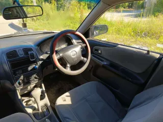 Mazda Familia, 2002. Легковой автомобиль, VIN: не установлен, мощность двигателя (кВт/л.с.): 63,75/85,0, гос. номер С224НН22. По кузову автомобиля присутствует коррозия, сгнившие пороги, арки, ржавчина на капоте, дверях и раме лобового стекла, пинается коробка с первой на вторую и не работает…