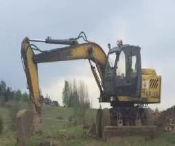 Экскаватор колесный ЕК-12-00, цвет серо-желтый, год выпуска 2007, паспорт (документа о регистрации) ВЕ 159860, гос номер 4394 НО 53