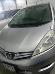Honda FIT SHUTTLE (Honda Fit Shuttle) 2013, номер кузова GG7-3103663. С имуществом можно ознакомиться по адресу: Российская Федерация, Республика Саха (Якутия), г. Якутск, ул. Курашова, д. 30/4 по предварительной записи у организатора торгов по номеру 8-914-228-72-61.