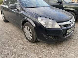 Opel Astra 2010 года выпуска, цвет черный, VIN XWF0AHL69B0006927.