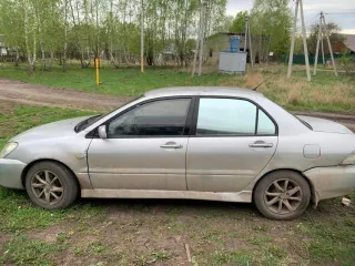 Мицубиси лансер 1,6 2003 года, VIN JMBSRCS3A4U002962.