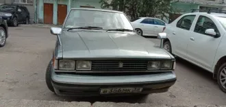 Toyota Cresta 1983, 135 л.с., 286000 км, легковой седан, VIN отсутствует, модель двигателя 1G, номер двигателя 5109149, кузов GX51-006961, цвет серый. Была замена двигателя, сейчас не на ходу, имеются вмятины, царапины (на фото), не эксплуатируется 3 года, хранится в гараже.