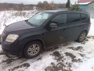Chevrolet Orlando 2014 Легковой автомобиль ШЕВРОЛЕ ОRLANDO VIN: XUUYF755JE0002251 Год выпуска: 2014 Кузов: XUUYF755JE0002251 Цвет: Черный Тип двигателя: Бензиновый Мощность двигателя: 141 л.с. 102,7 кВт Рабочий объем двигателя: 1798 куб. см ПТС 50 РР 679540 СТС 99 65 № 931401 Вид права…