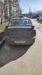 Состояние удовлетворительное, соответствует году выпуска, автомобиль заводится, на ходу, задний бампер трещины, вмятины на капоте, спущено колесо, крышка багажника вмятины и царапины.