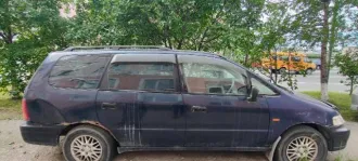 Honda Odyssey 1995 Легковой автомобиль ХОНДА ОДИССЕЙ, 1995 г.в., грз Т685ЕУ49. Кузов № RAZ*1019061, цвет: синий, мощность двигателя, кВт/л.с.: 106,6/145.