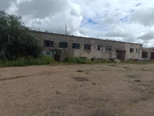 Гараж для ремонта тракторов площадью 1945.2 кв.м. Расположен по адресу: Забайкальский край, Краснокаменский район, поселок Целинный, улица Гаражная, дом 3, строение 1. Назначение: нежилое. Количество этажей: 1. Кадастровый номер: 75:09:050101:393. Имеется обременение: арест ФССП, запрет на…