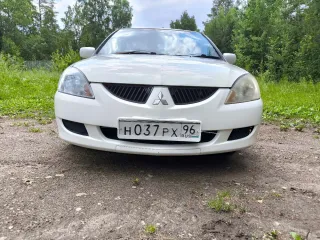 Мицубиси Лансер 2003 года выпуска номер двигателя 4G15CX0816 цвет белый