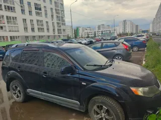 Mitsubishi Outlander 2008 OUTLANDER 2.4 Черный, VIN JMBXTCW5W9Z006075, год выпуска 2008, гос. номер К623РС702.