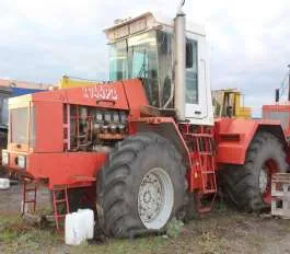 Колесный трактор К-701 1991 года выпуска, госномер 4803КО45, заводской номер 9100725, двигатель 00424, желтый цвет.