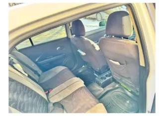 Nissan Tiida 2007 года, 109 л.с., пробег 300000 км. Автомобиль Nissan Tiida Latio, цвет белый, ПТС 25 УВ 315859, государственный номер К985АН125, страна-изготовитель Япония, разрешенная максимальная масса 1475 кг, масса без нагрузки 1200 кг.