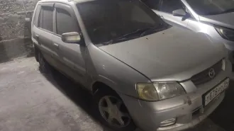 Mazda Demio 2001 года выпуска, серый цвет. Государственный номер Т878РО54, номер кузова DW3W628377. Залоговое имущество.