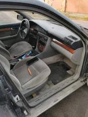 Audi 100 1991 года выпуска, VIN WAUZZZ4ZMN028972. Цвет кузова черный, механическая коробка передач.