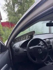 Nissan Almera 2016 года, 102 л.с., пробег 288 287 км. Бензин, объем двигателя 1 598 см³, механическая коробка передач. VIN: Z8NAJL10056948080.