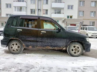 Nissan Cube 2000 года, госномер Н845МУ03, черный цвет. VIN: AZ10039628, двигатель бензиновый 1.3 л (85 л.с.), снаряженная масса 980 кг, полная масса 1200 кг. Производство: Япония.