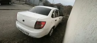 Легковой автомобиль Лада 219010 2013 года, цвет белый, тип кузова седан. VIN: XTA219010DY030264, регистрационный знак Р803КА 126. Объем двигателя 1596 см³, мощность 64 кВт/87 л.с., экологический класс 4. Ограничение: запрет на регистрационные действия, обременение залог. Ключи и документы…
