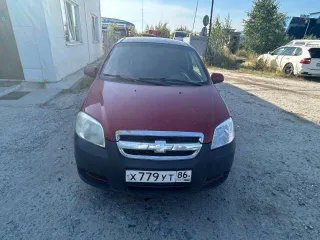 Chevrolet Aveo 2011 года, седан, 101 л.с., пробег 167439 км. Госномер Х779УТ86, цвет красный, VIN XUUSF69W9B0007660, ПТС 86 РТ 916922, СТС 99 76 822033. Требуется замена стоек.