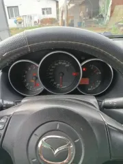 Mazda 3 2005 года, 105 л.с., пробег 570 047 км. Автомобиль после ДТП, оценивается как удовлетворительное, в исправном состоянии на ходу. Пороги и днище кузова не имеют глубокой коррозии. Двигатель работает без нареканий. Лобовое стекло менялось. Коробка передач механическая. Требуется замена…