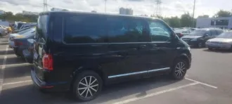 Volkswagen Multivan 7HC, 2019 г.в., госномер Х211КН799, цвет черный, VIN WV2ZZZ7HZKH098051.