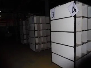 Стеллажи металлические с полками ДСП 94 шт.