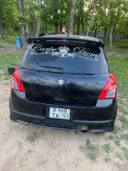 Suzuki Swift 2005, черный, 67 л.с. (91 кВт), 343142 км, кузов № Z011S150327, VIN отсутствует, г/н Х440ТА125.