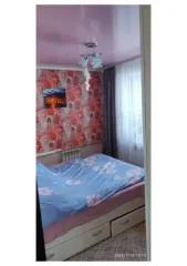 Земельный участок и жилой дом в селе Бобровка Челябинской области по адресу: Челябинская область, Троицкий район, село Бобровка, улица Красных Партизан, дом 15. Кадастровые номера: 74:20:2307001:141 (земельный участок) и 74:20:2307001:761 (жилой дом).