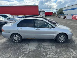 Mitsubishi Lancer 2004 года, 90 л.с., пробег 193880 км. Легковой автомобиль. Mitsubishi Lancer 1.6л, 2004 г.в., ГРЗ Х598ТК96, VIN JMBSNCS3A4U008391.