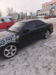 Toyota Carina 1993 года, 125 лс, 190000 км, АКПП. Автомобиль Toyta Karina (Toyota Carina), 1993 года выпуска, VIN: отсутствует, номер кузова: ST2000003756, гос. номер: А705РМ122. Автомобиль после ДТП. Удар пришёлся в заднюю часть, из-за чего имеется серьёзная деформация багажника, заднего бампера…
