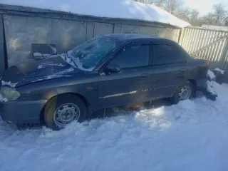 Kia Spectra (КИА СПЕКТРА), VIN XTKFB227260006268, регистрационный знак В103ТК62, цвет Серый. Тип ТС и год выпуска отсутствуют. Предмет залога находится у Залогодателя в собственности, что подтверждается Залогодателем и следующими документами: Свидетельство ТС № 9927884885, Паспорт ТС № 37НХ841977.