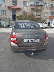 Lada Granta, 2024 года, 106 л.с., 133330 км. Автомобиль легковой, марка: Lada, модель: Granta, VIN: XTA219070R1054978, гос. рег. номер: М264МВ702, год изготовления: 2024.