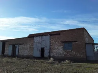 Земельный участок 9.9 га и 17 объектов, Оренбургская область. Земельный участок площадью 99359 кв.м., кадастровый номер 56:03:0803001:100. Тринадцать зданий с кадастровыми номерами: 56:03:0803001:130, 56:03:0803001:168, 56:03:0803001:125, 56:03:0803001:129, 56:03:0803001:126, 56:03:0803001:131…