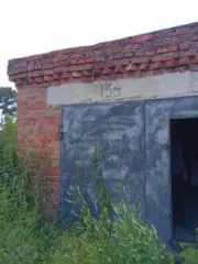 Земельный участок 27 +/- 2 кв.м., кадастровый (условный) номер: 42:33:0103008:247 и здание, площадь 30.8 кв.м., назначение: нежилое, кадастровый (условный) номер: 42:33:0103008:293, расположенные по адресу: Кемеровская область, г Тайга, ул Добролюбова, гараж № 136.