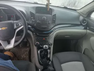 Chevrolet Orlando 2014 Легковой автомобиль ШЕВРОЛЕ ОRLANDO VIN: XUUYF755JE0002251 Год выпуска: 2014 Кузов: XUUYF755JE0002251 Цвет: Черный Тип двигателя: Бензиновый Мощность двигателя: 141 л.с. 102,7 кВт Рабочий объем двигателя: 1798 куб. см ПТС 50 РР 679540 СТС 99 65 № 931401 Вид права…