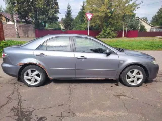 Mazda 6 2004 года, VIN JMZGG12F551248199, госномер Р990РМ177. Мощность 141 л.с. (104 кВт), объем двигателя 1999 куб. см. Масса без нагрузки 1260 кг, разрешенная максимальная масса 1830 кг. Модель двигателя LF 365249, номер кузова 1248199. Цвет кузова темно-серый, тип двигателя бензиновый…