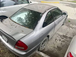 Автомобиль Mitsubishi Mirage, 1997 года выпуска, VIN: отсутствует. Тип ТС: легковой универсал, номер кузова CJ2A0102090, государственный регистрационный номер Р987СА154, паспорт транспортного средства 54НХ962098. Цвет кузова: серый.