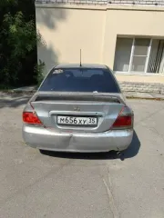 Мицубиси Lancer 1.6, VIN JMBSNCS3A5U005993, 2004 г., госномер М656ХУ 35, серебристый, на ходу