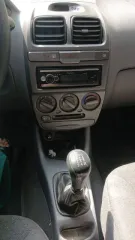 Хендэ Акцент 2003 года, серебристый. VIN: X7MCF41GP4M007673, ПТС: 63РН 449751, госномер Р565КА64. Двигатель бензиновый G4EC3626195, объем 1.5 л (1495 куб. см), мощность 102 л.с. Максимальная масса 1555 кг, масса без нагрузки 1176 кг. Экологический класс не установлен. Произведен ООО ТАГАЗ (Россия).